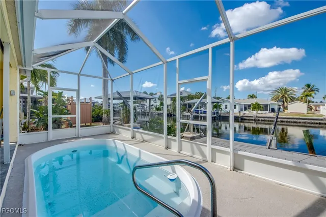 a view of swimming pool with a patio
