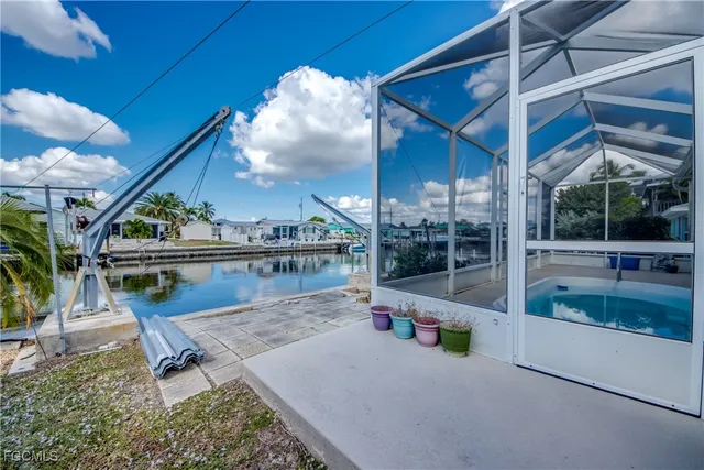 a view of a swimming pool with a patio
