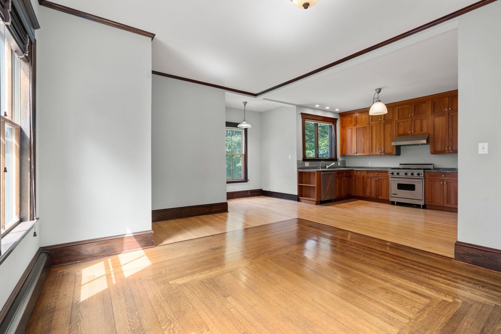 40 Cushing Street, Unit 40 Cambridge, MA 02138 - Photo 16 of 42 a view of a kitchen with a sink and a large window