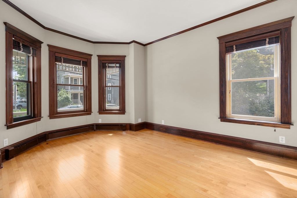 40 Cushing Street, Unit 40 Cambridge, MA 02138 - Photo 20 of 42 a view of an empty room with a window