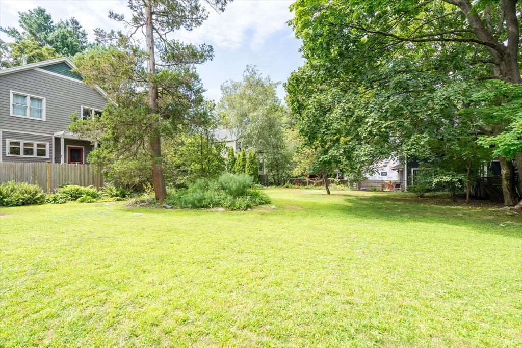 40 Cushing Street, Unit 40 Cambridge, MA 02138 - Photo 2 of 42 a house view with swimming pool in front of it