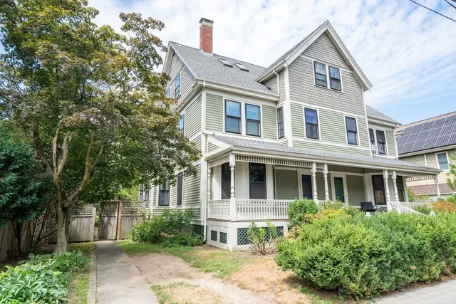 a view of yard with swimming pool and green space