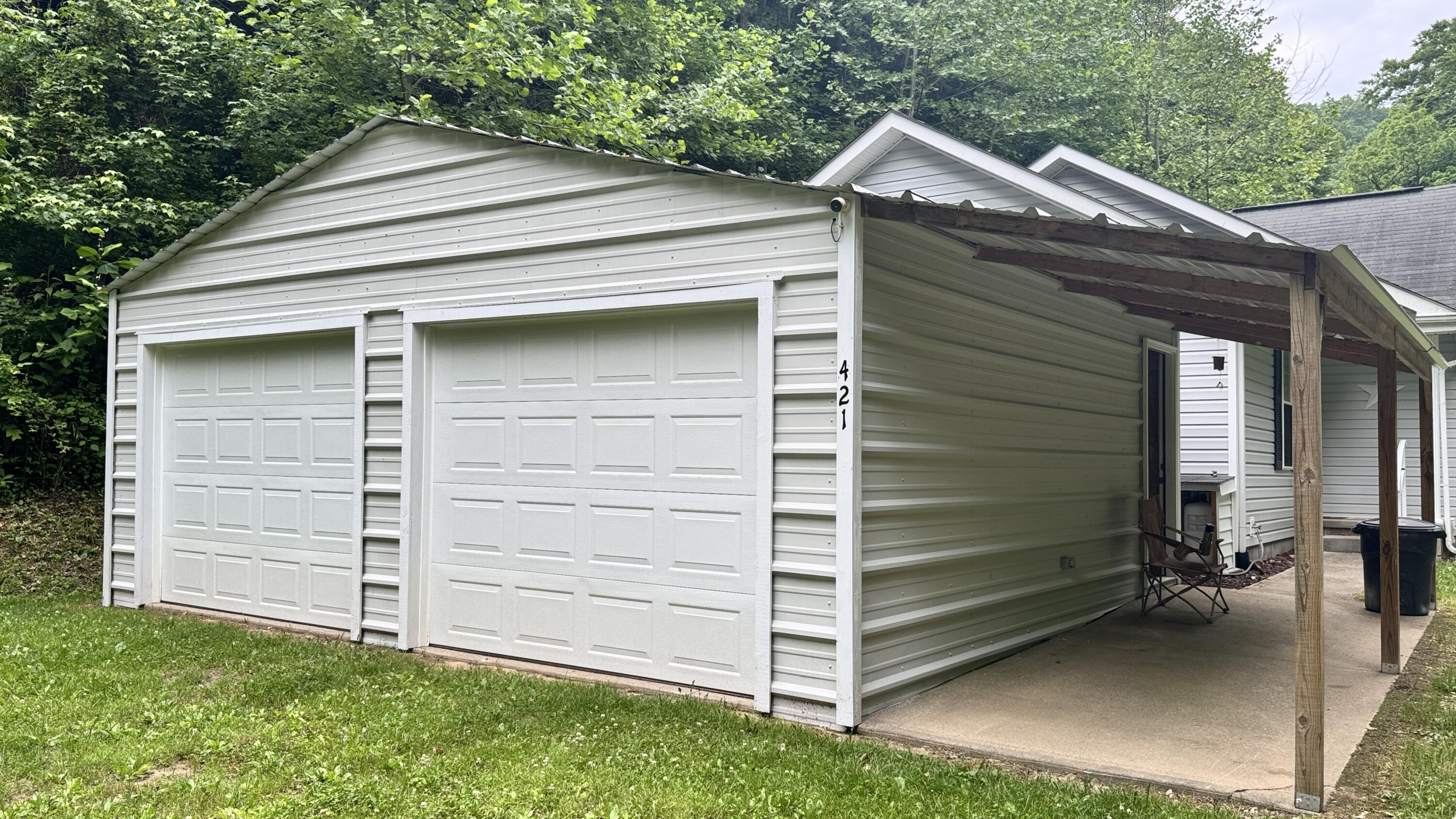 421 Wren Br Road Oneida, KY 40972 - Photo 16 of 34 Detached Garage with concrete Floor and covered porch