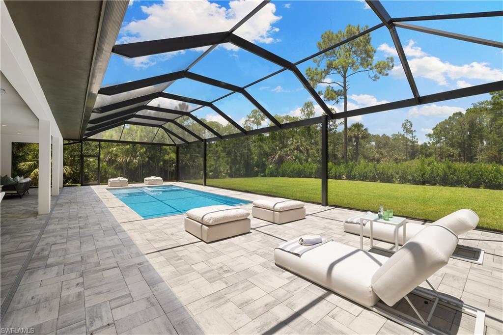 4751 1st Avenue Southwest Naples, FL 34119 - Photo 21 of 25 a view of yard with patio