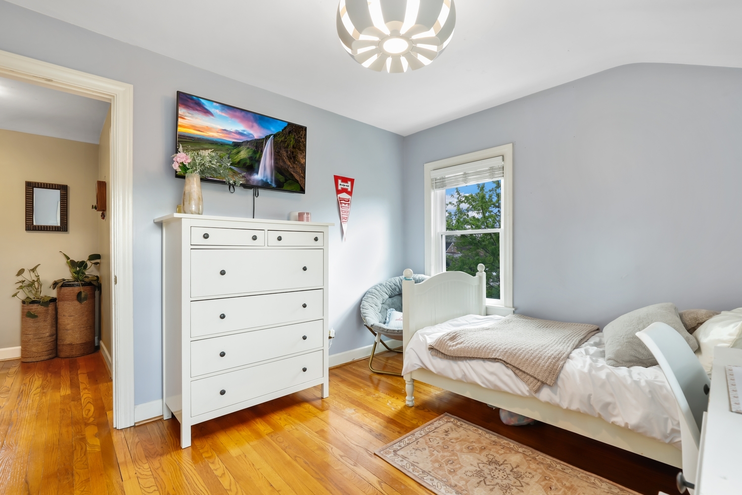 2357 South 3rd Avenue North Riverside, IL 60546 - Photo 14 of 28 a bedroom with a bed and a chandelier