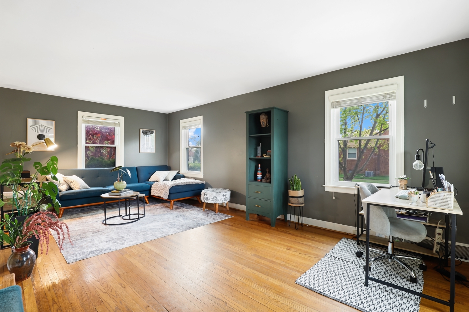 2357 South 3rd Avenue North Riverside, IL 60546 - Photo 2 of 28 a living room with furniture a wooden floor and a table