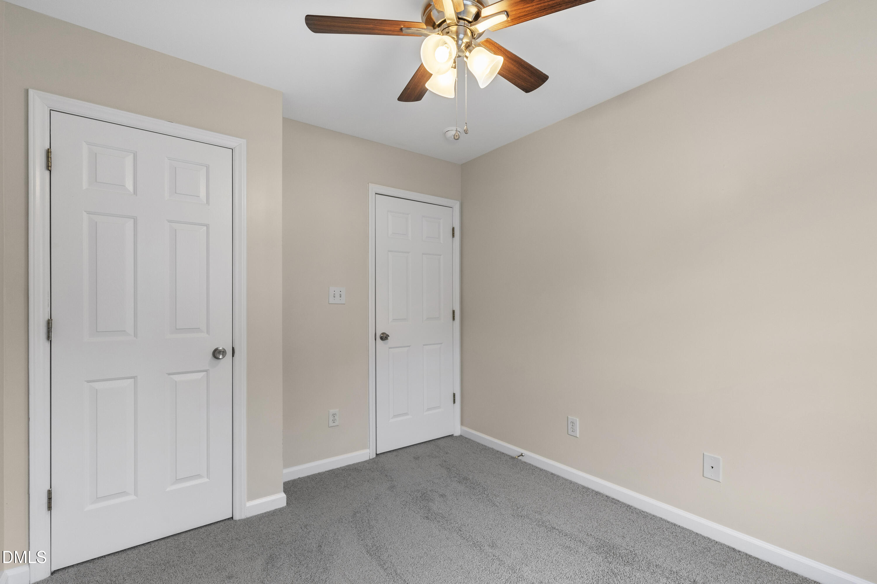 6013 San Marcos Way Raleigh, NC 27616 - Photo 19 of 21 an empty room with chandelier fan