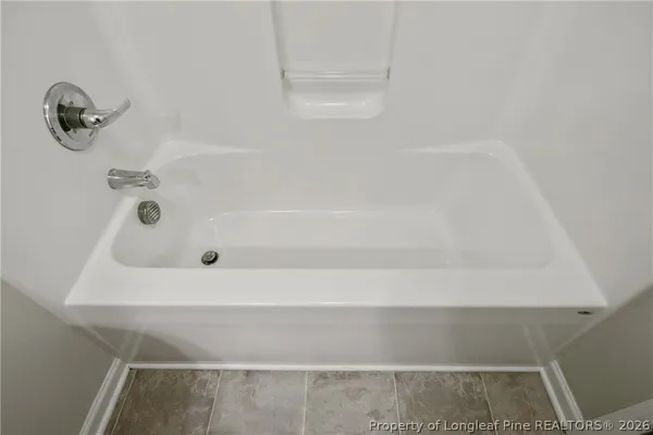 a bathroom with a bathtub