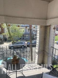 78 Center Street, Unit 2 Perth Amboy, NJ 08861 - Photo 2 of 8 a outdoor living space with furniture and a fireplace