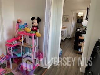 78 Center Street, Unit 2 Perth Amboy, NJ 08861 - Photo 3 of 8 view of kids room with toys