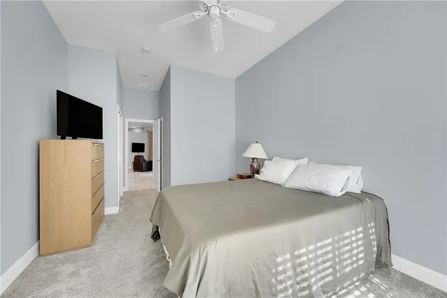 a view of a livingroom with a flat screen tv and a window