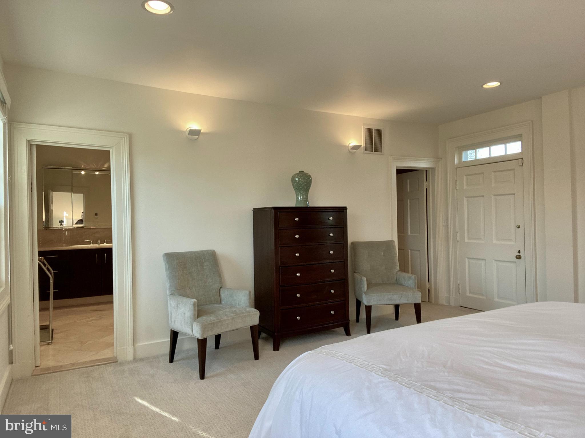 121 Upnor Road Baltimore, MD 21212 - Photo 46 of 79 a bedroom with a bed and chair