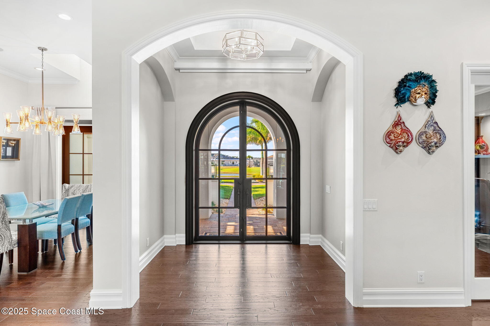 4655 Tea Tree Court Rockledge, FL 32955 - Photo 11 of 58 a view of an entryway with wooden floor