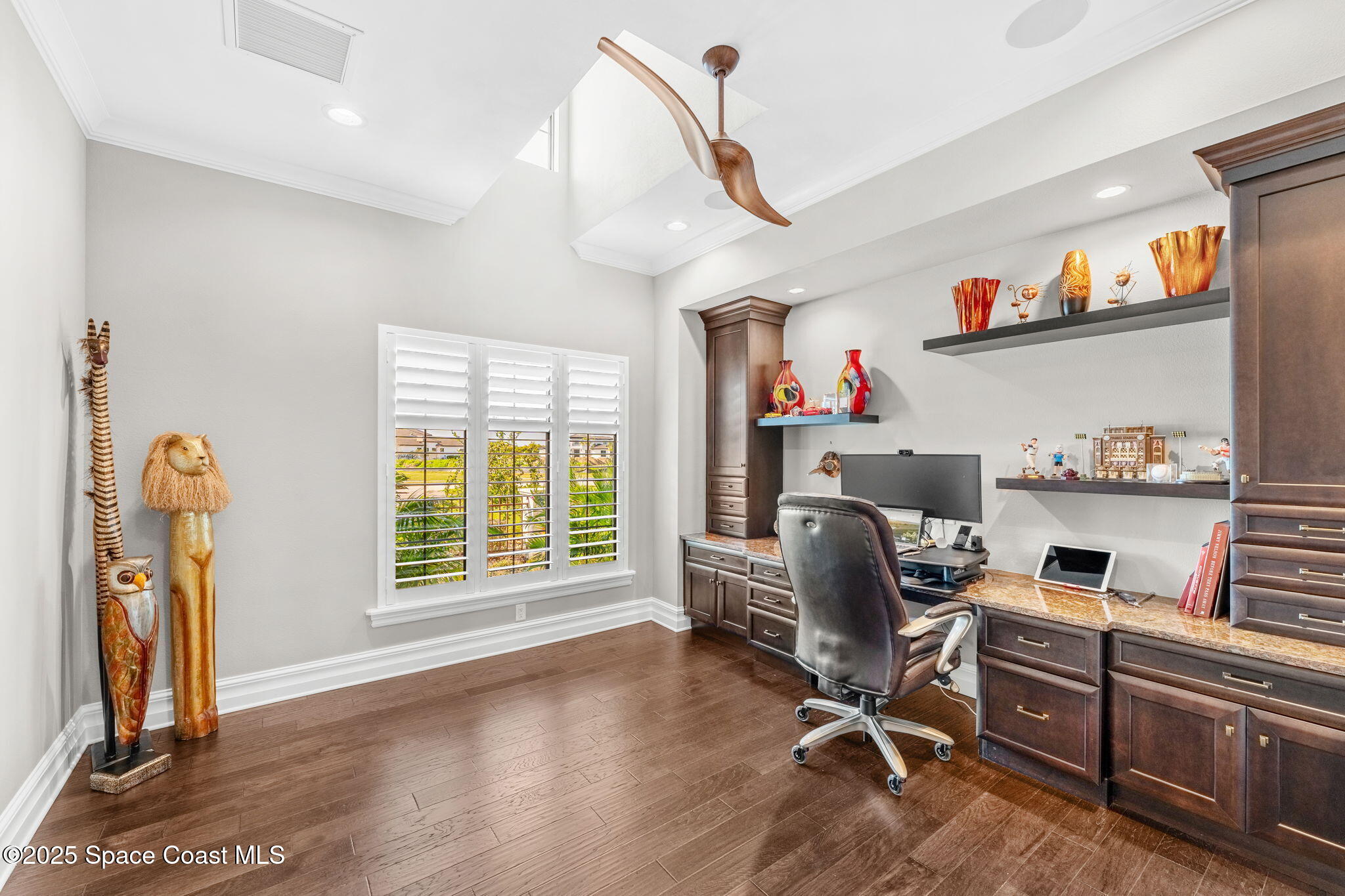 4655 Tea Tree Court Rockledge, FL 32955 - Photo 35 of 58 a workspace with furniture and a window