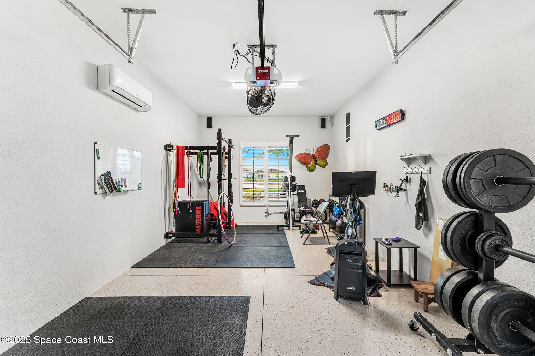 4655 Tea Tree Court Rockledge, FL 32955 - Photo 42 of 58 a view of a room with gym equipment