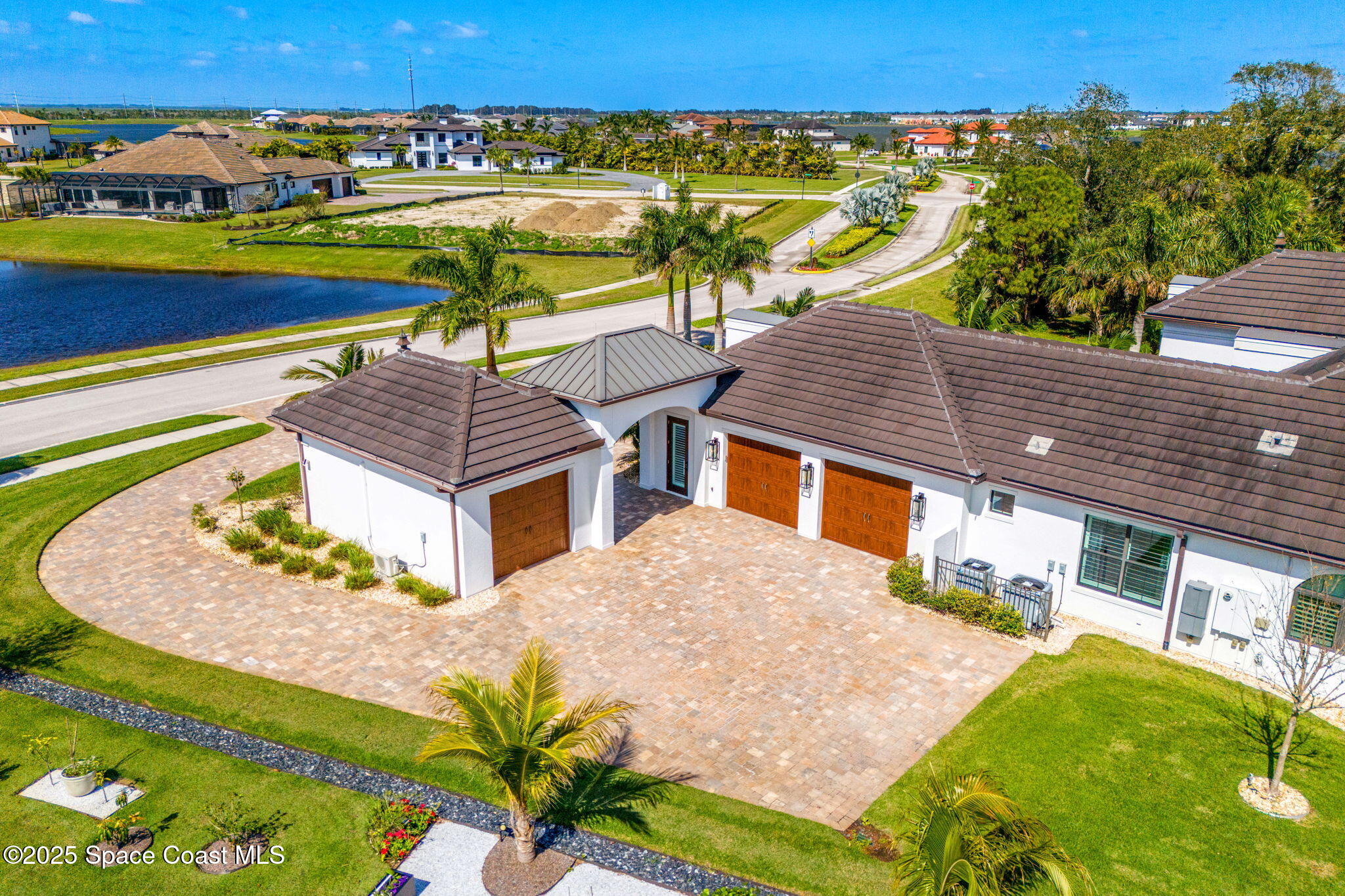 4655 Tea Tree Court Rockledge, FL 32955 - Photo 45 of 58 a view of a swimming pool with a lounge chairs