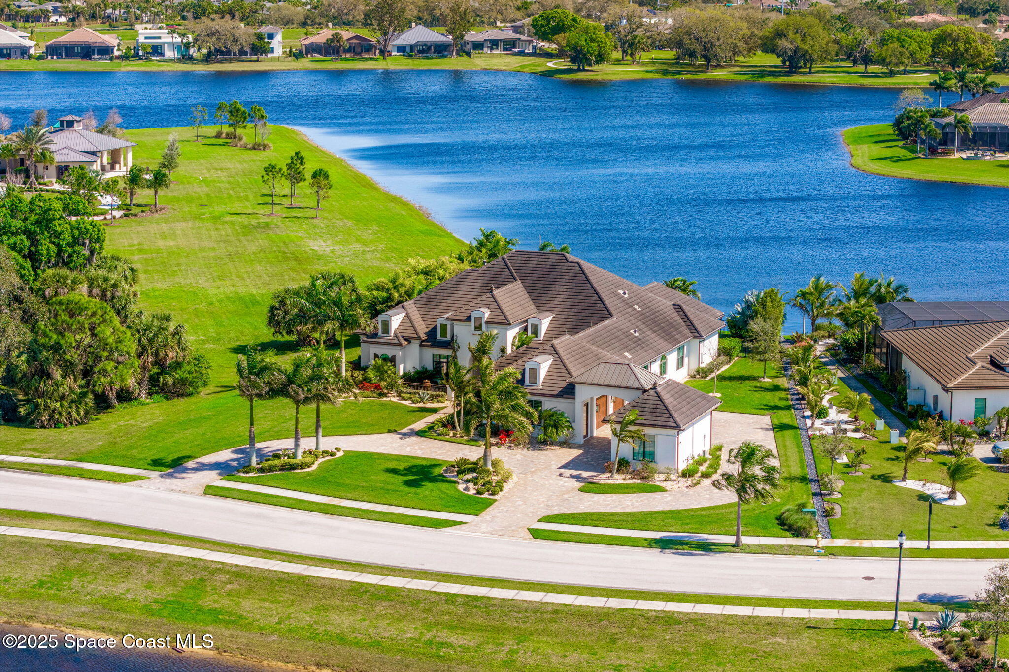 4655 Tea Tree Court Rockledge, FL 32955 - Photo 51 of 58 a view of a swimming pool with a yard
