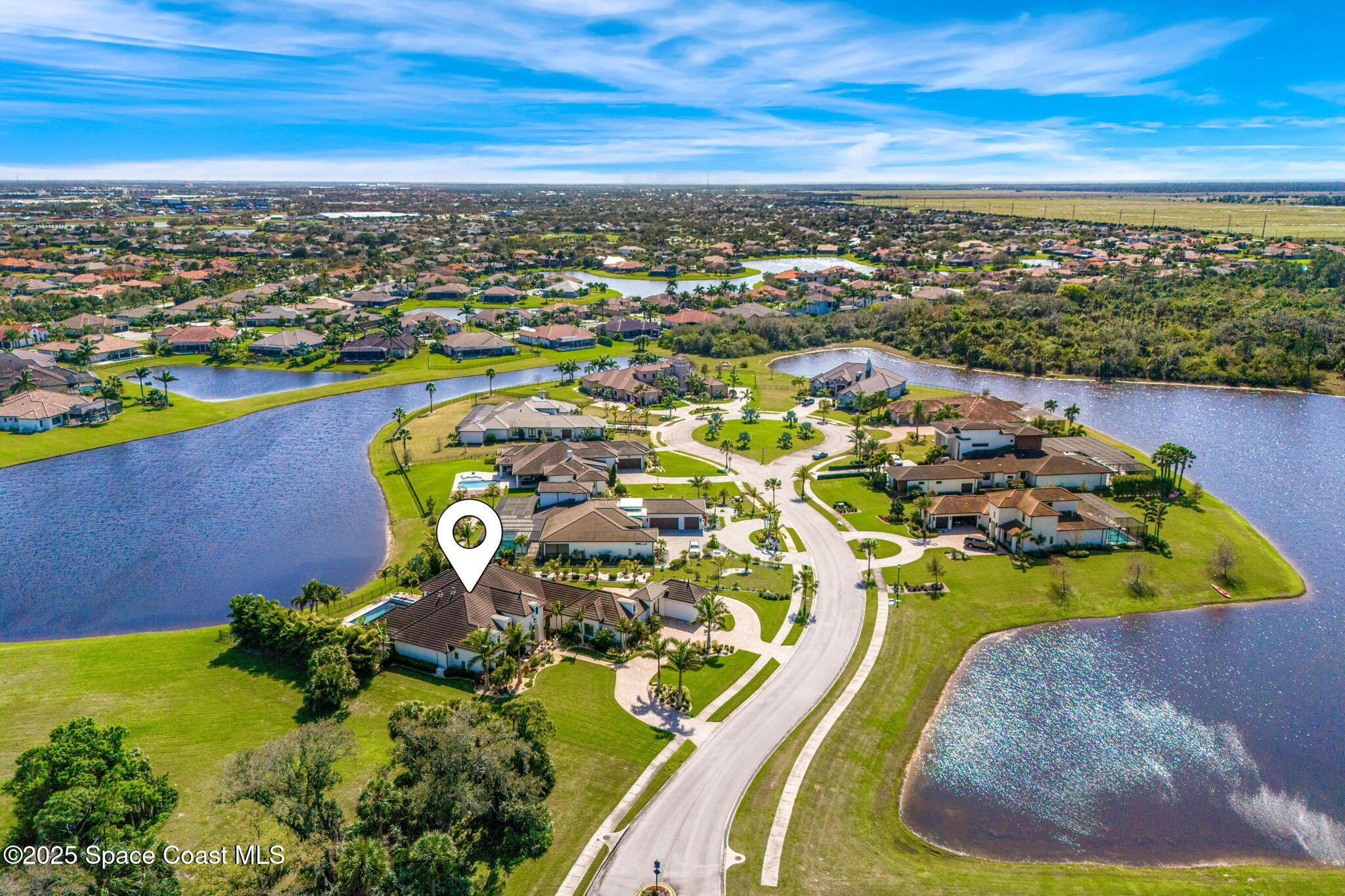 4655 Tea Tree Court Rockledge, FL 32955 - Photo 53 of 58 an aerial view of a house with a swimming pool