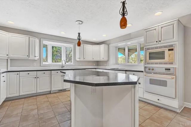 a view of a forest from a balcony