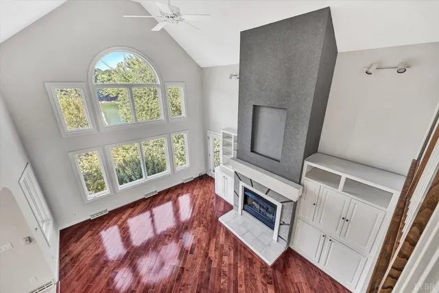 a view of a porch with wooden floor and outdoor space