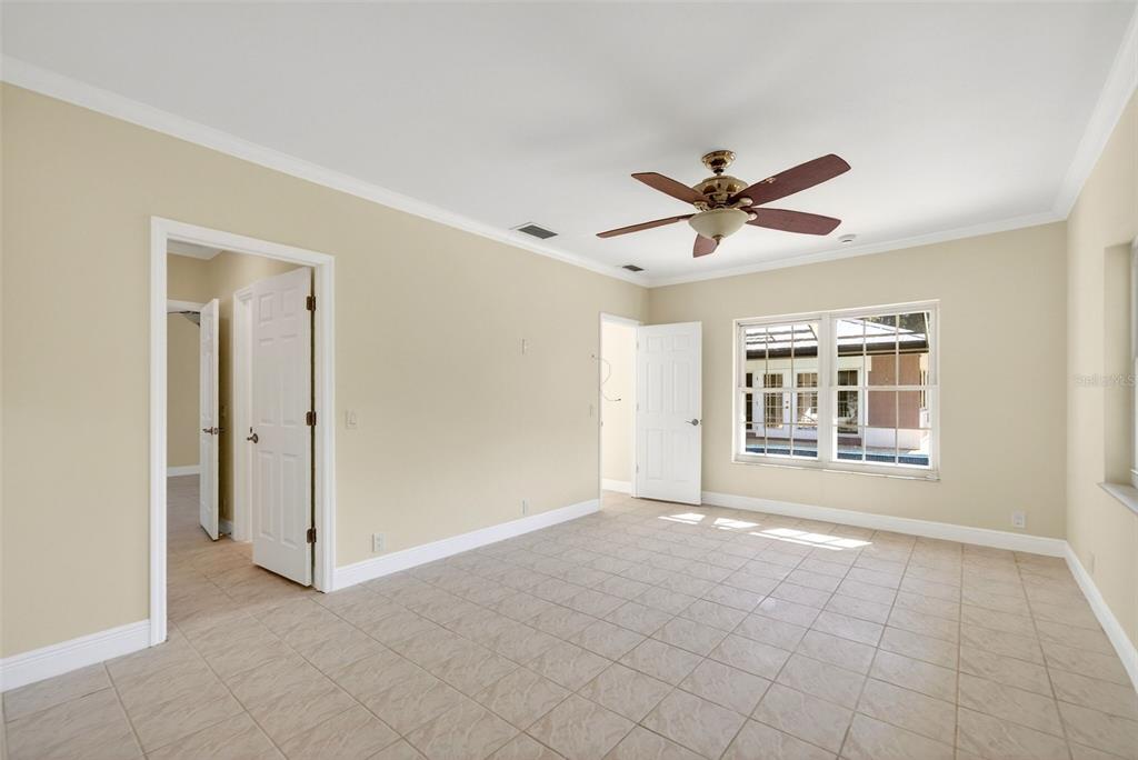 7108 Midnight Pass Road Sarasota, FL 34242 - Photo 23 of 83 a view of an empty room with a window