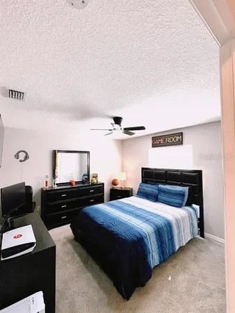 a bathroom with a sink a toilet a shower and a bathtub