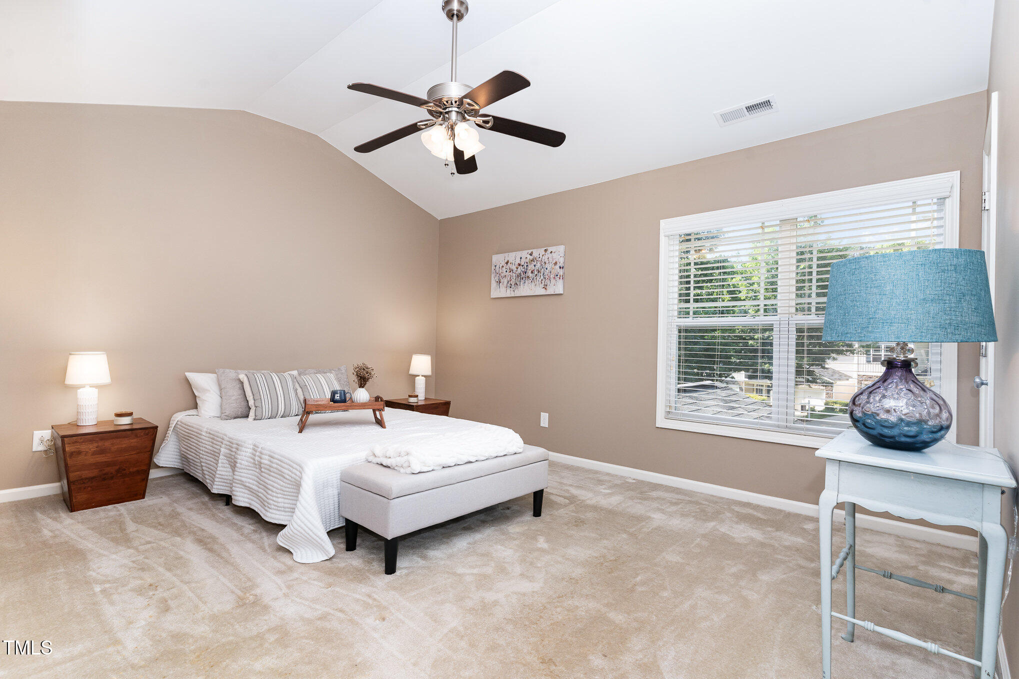 4732 Altha Street Raleigh, NC 27606 - Photo 11 of 23 a bedroom with bed and window