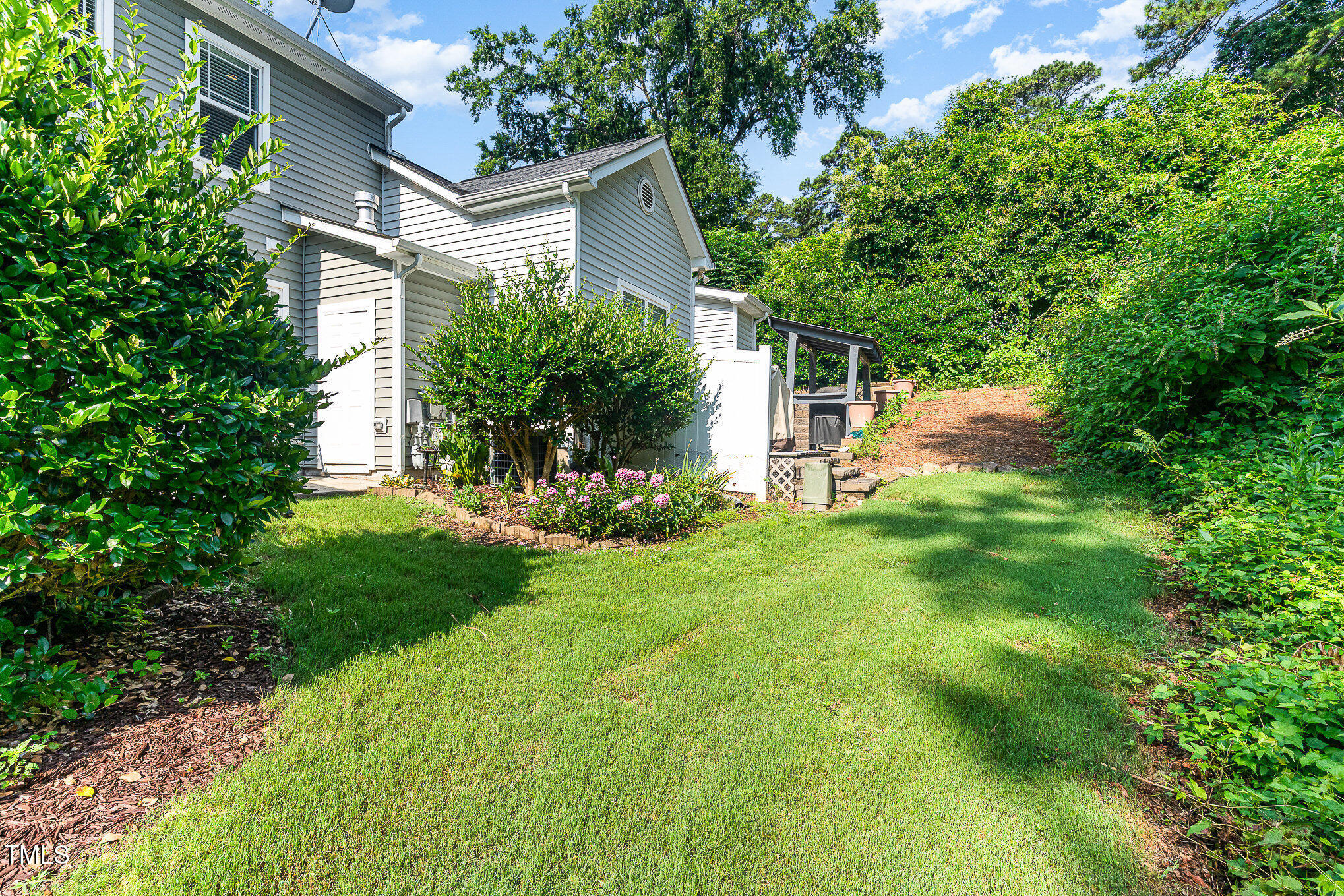 4732 Altha Street Raleigh, NC 27606 - Photo 16 of 23 a view of a house with a yard
