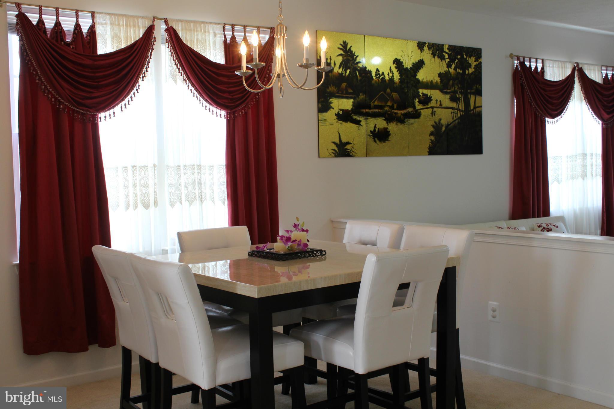 9604 Maxwell Road Middle River, MD 21220 - Photo 3 of 16 a view of a dining room with furniture window and outside view