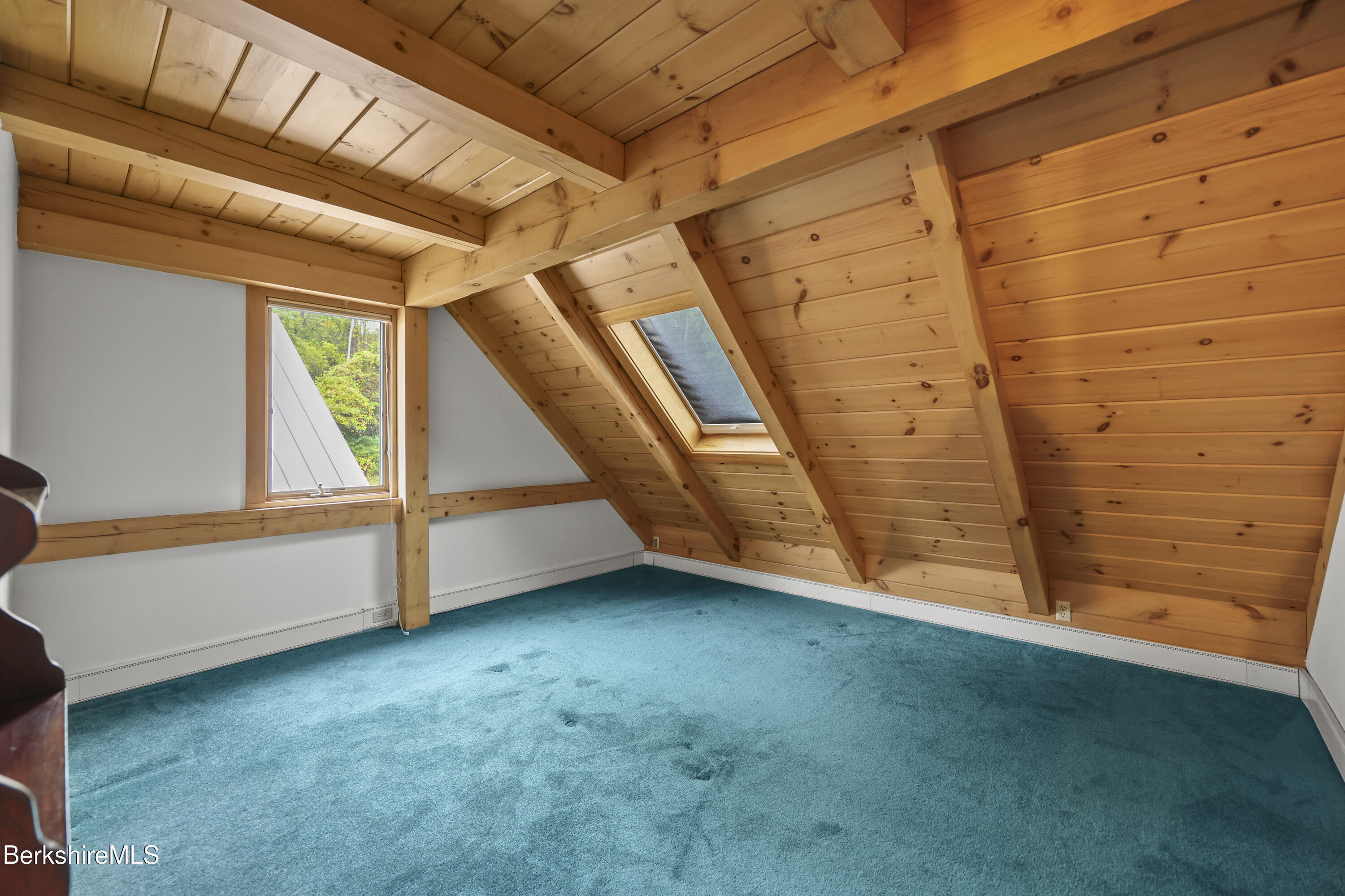 1030 Simonds Road Williamstown, MA 01267 - Photo 39 of 76 a view of an empty room with wooden walls