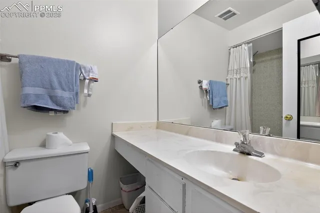 a view of swimming pool with seating space