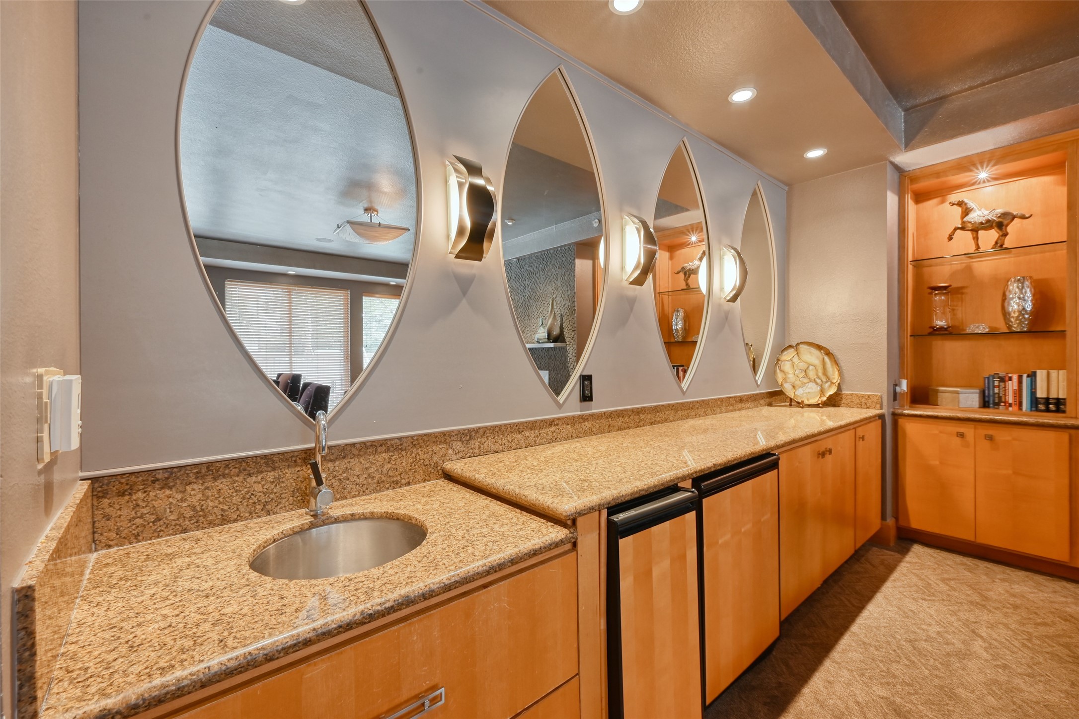 3505 Sage Road, Unit 1206 Houston, TX 77056 - Photo 12 of 50 a bathroom with a granite countertop sink and a mirror