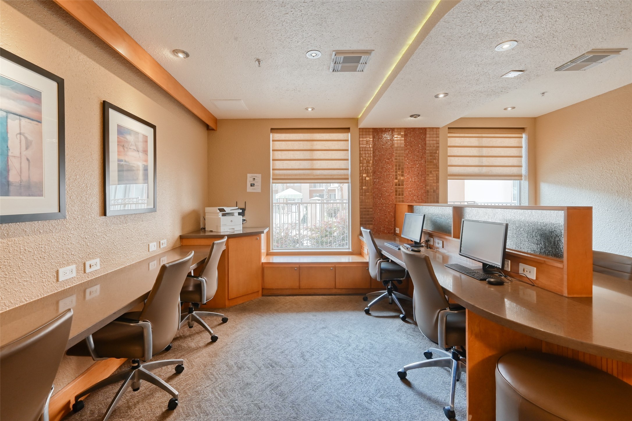 3505 Sage Road, Unit 1206 Houston, TX 77056 - Photo 16 of 50 a view of a workspace with furniture and a window