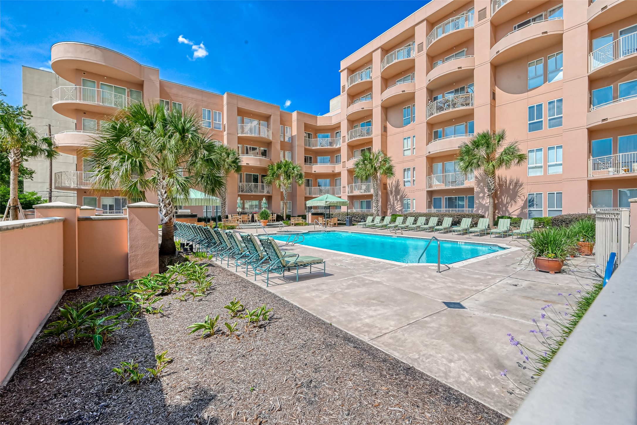 3505 Sage Road, Unit 1206 Houston, TX 77056 - Photo 43 of 50 a view of a building with garden