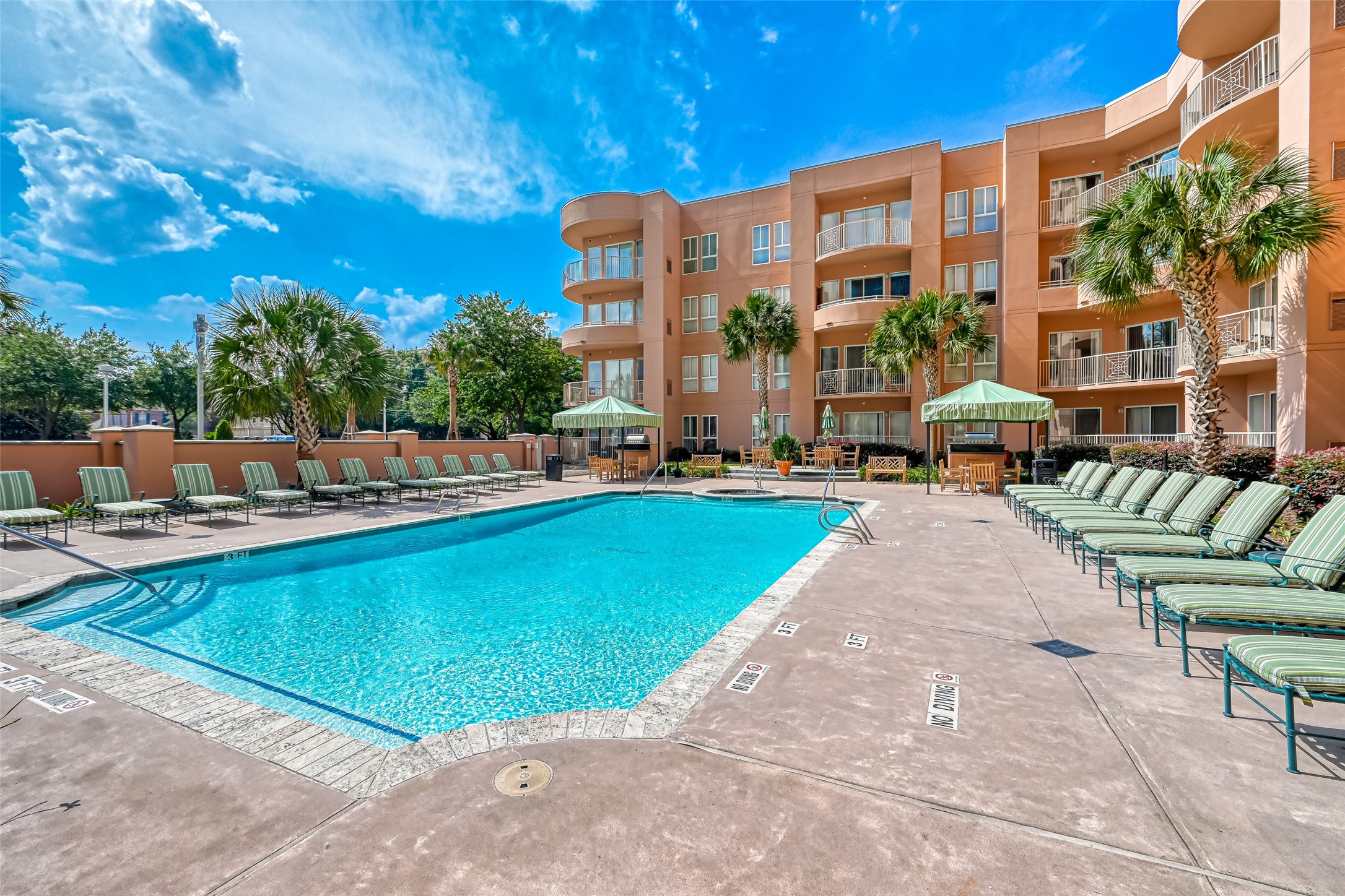 3505 Sage Road, Unit 1206 Houston, TX 77056 - Photo 44 of 50 a view of swimming pool with outdoor seating and a patio
