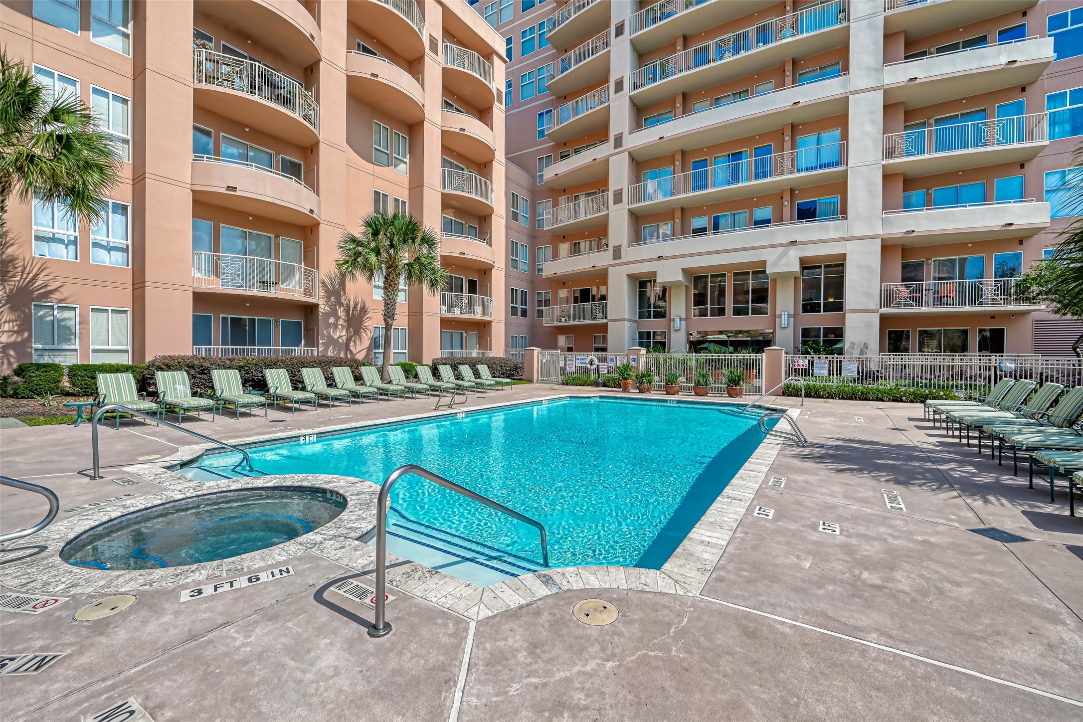 3505 Sage Road, Unit 1206 Houston, TX 77056 - Photo 47 of 50 a view of a building with a swimming pool