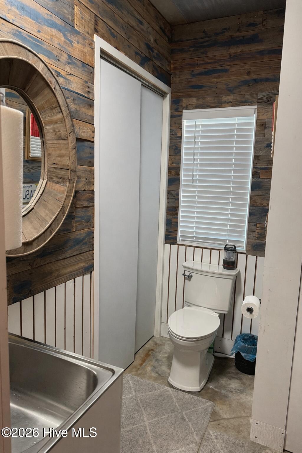 330 Cape Lookout Loop Emerald Isle, NC 28594 - Photo 30 of 50 downstairs 1/2 bath in garage