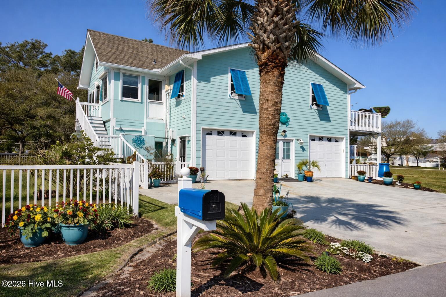 330 Cape Lookout Loop Emerald Isle, NC 28594 - Photo 3 of 50 garage side entry
