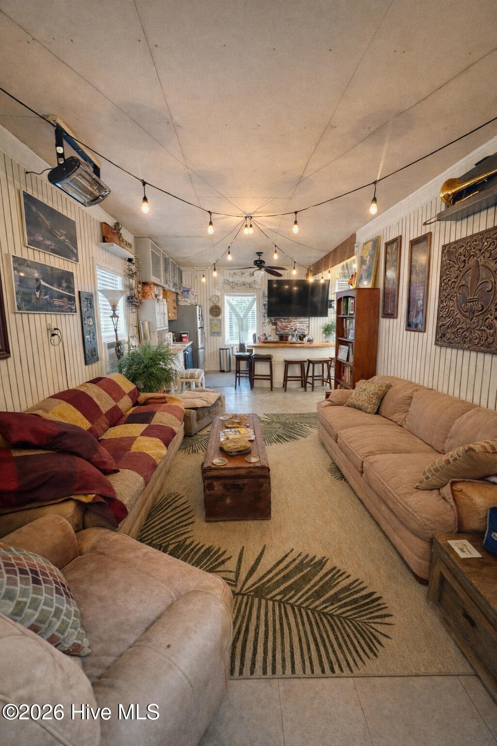 330 Cape Lookout Loop Emerald Isle, NC 28594 - Photo 32 of 50 flex space in garage for hanging out and entertaining