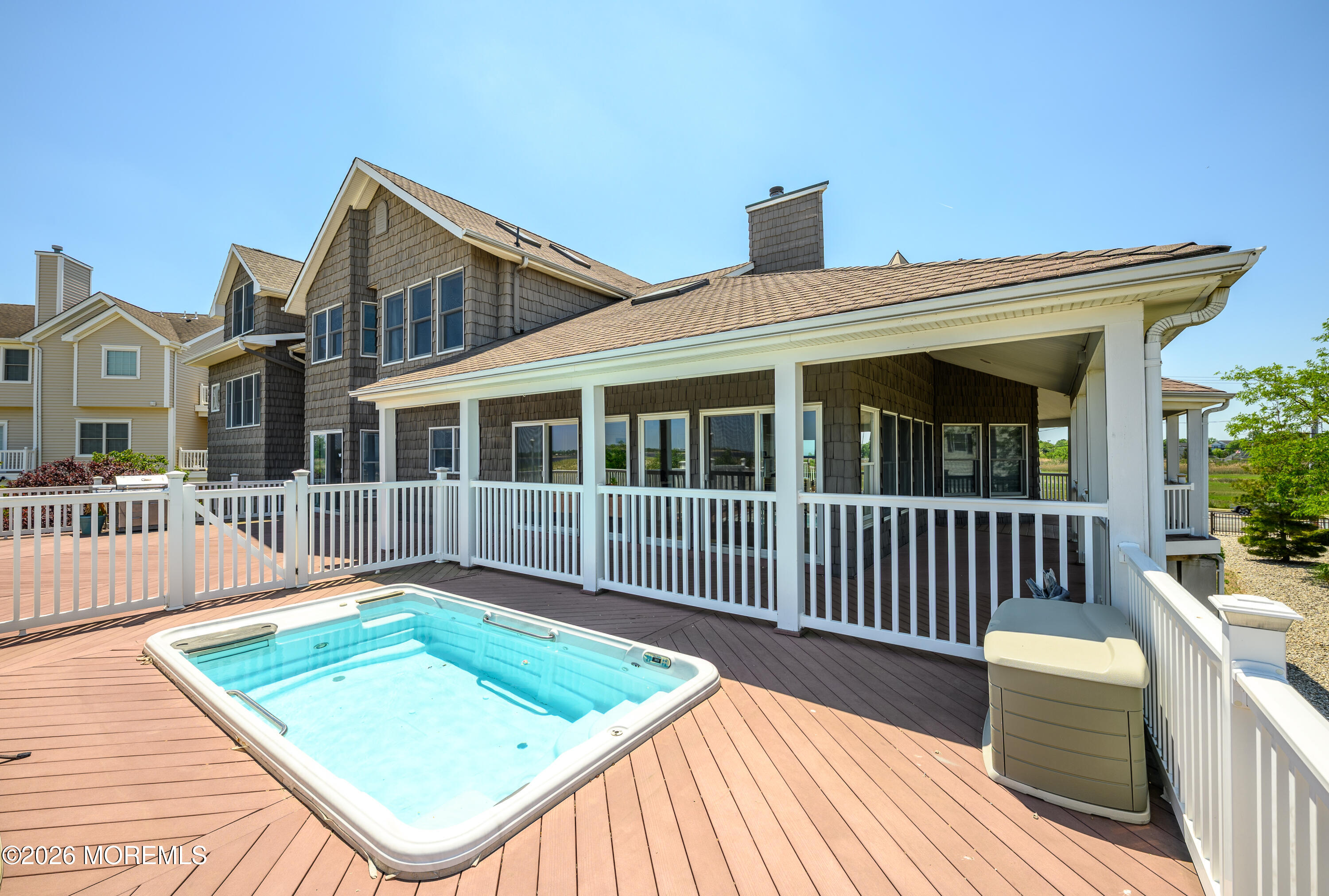 805 Front Street Union Beach, NJ 07735 - Photo 42 of 65 a view of a house with a roof deck