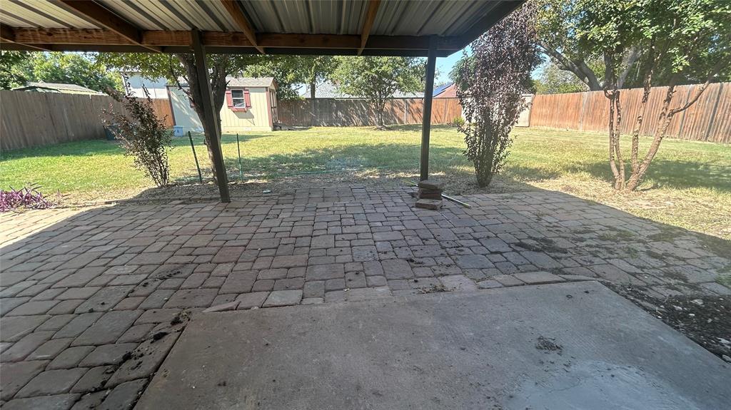 6705 Red Fox Trail Fort Worth, TX 76137 - Photo 13 of 15 a view of a yard with a tree