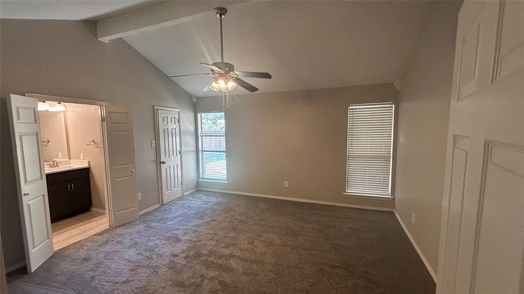 6705 Red Fox Trail Fort Worth, TX 76137 - Photo 8 of 15 a view of empty room with chandelier fan and window