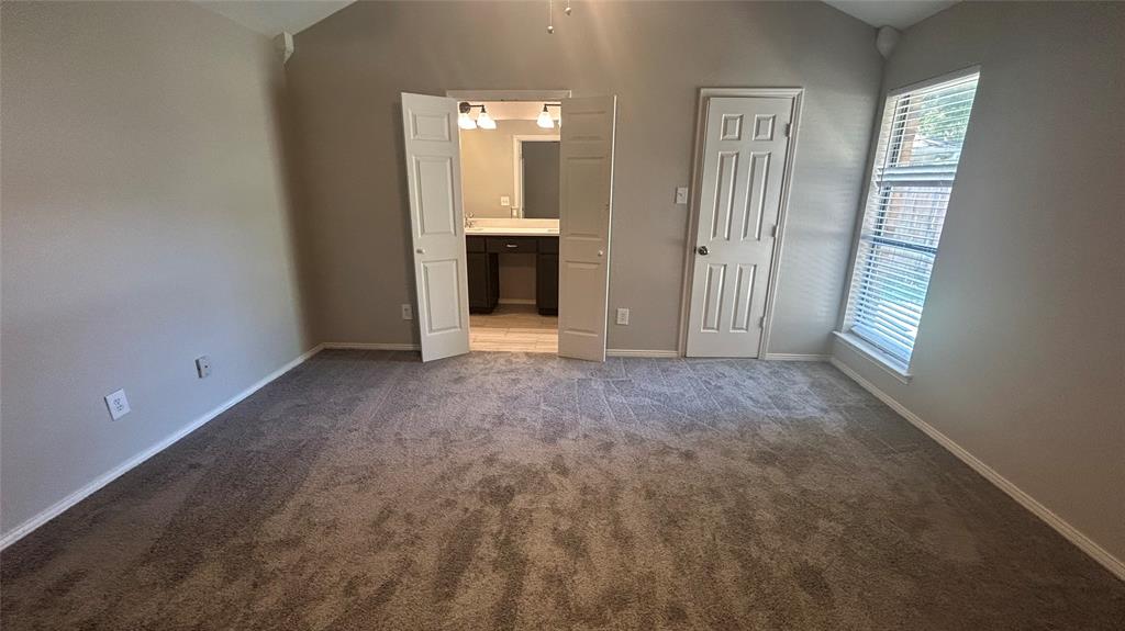 6705 Red Fox Trail Fort Worth, TX 76137 - Photo 9 of 15 an empty room with windows