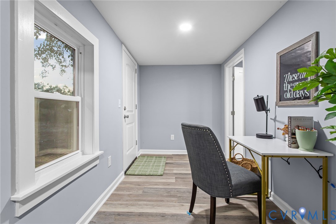 7946 Howerton Road Dunnsville, VA 22454 - Photo 15 of 47 a workspace with furniture and window