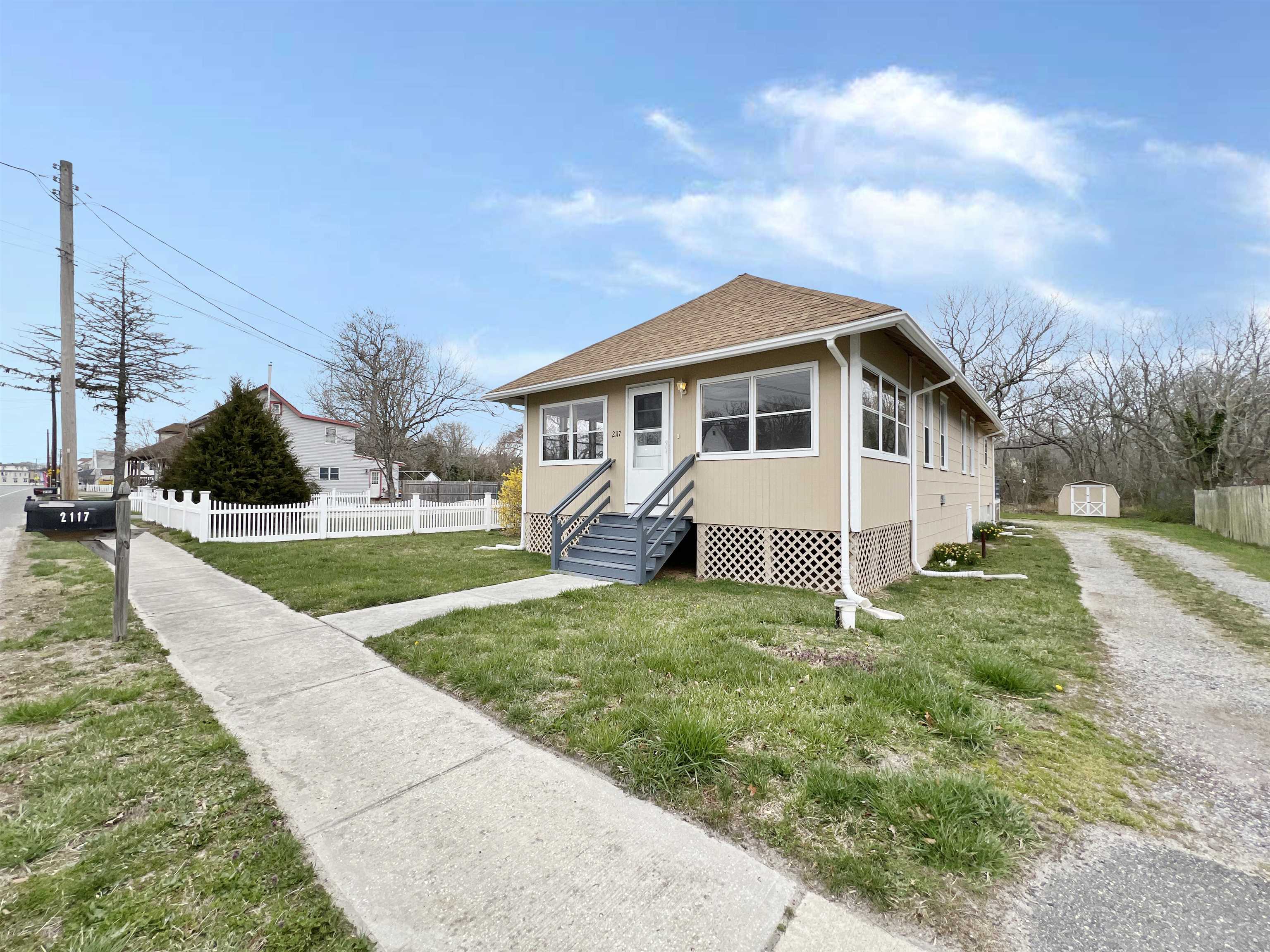 2117 Highway 50 Tuckahoe, NJ 08270 - Photo 1 of 23 a view of an house with backyard and trees