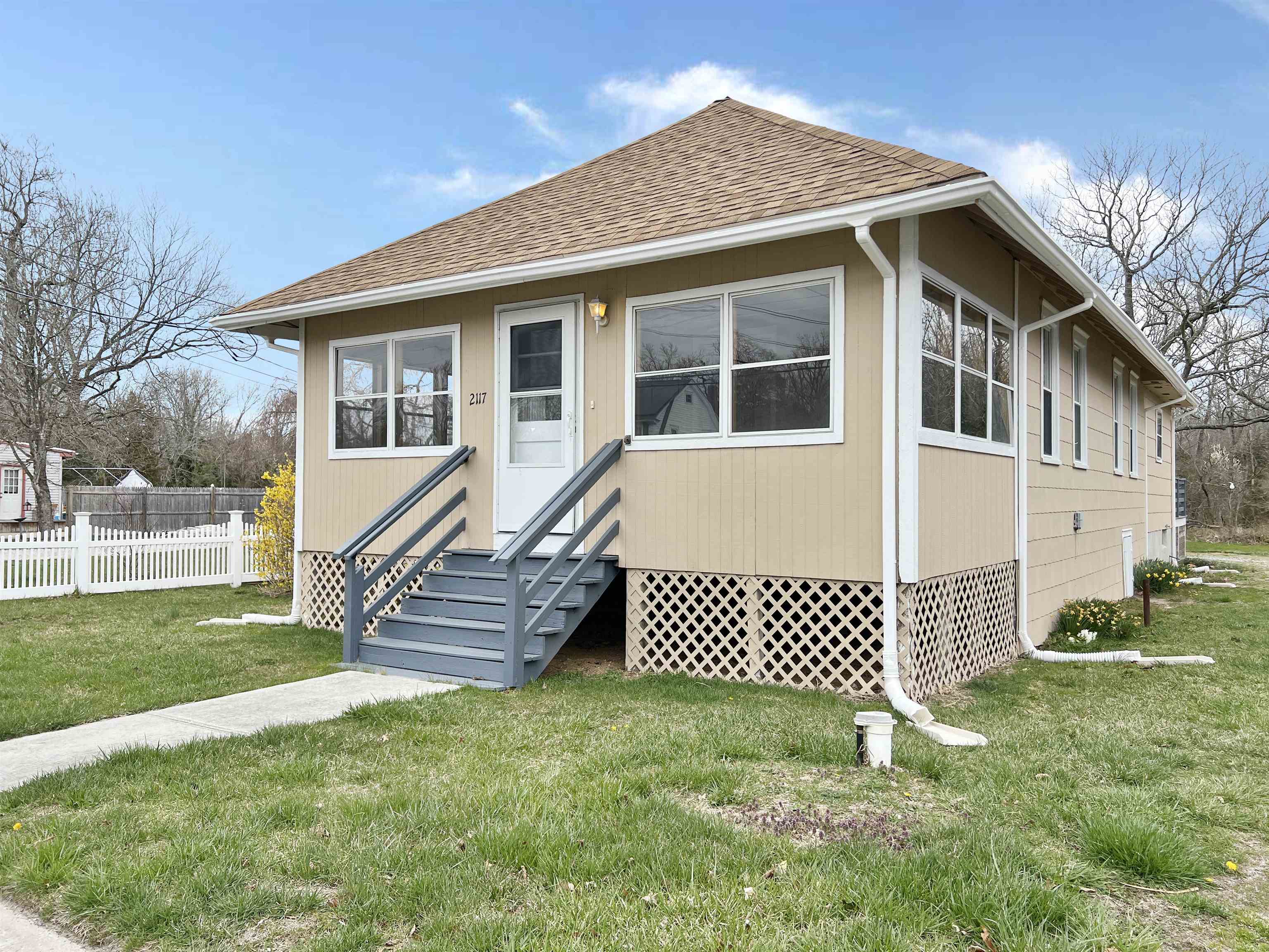 2117 Highway 50 Tuckahoe, NJ 08270 - Photo 2 of 23 a front view of a house with a garden