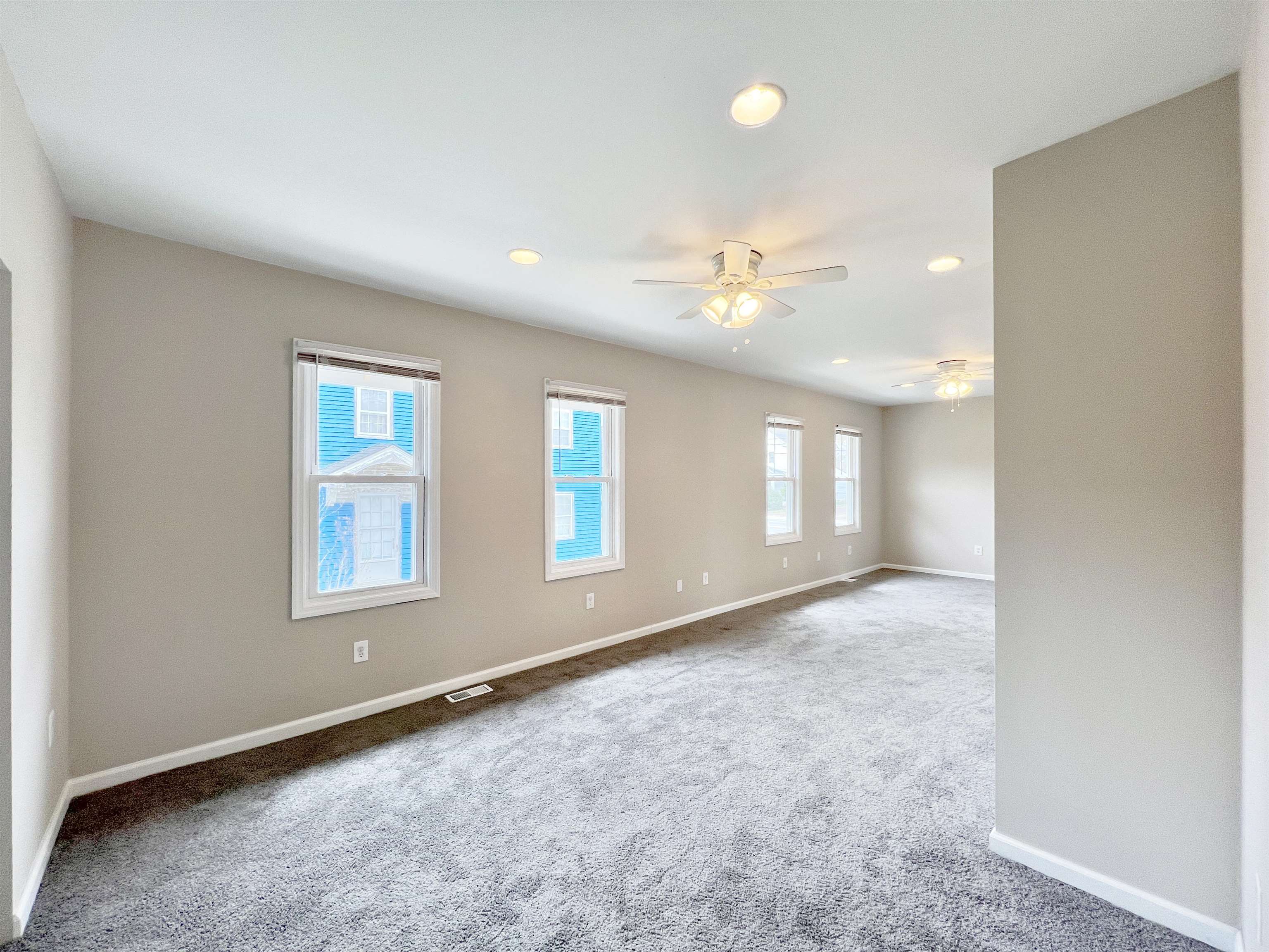 2117 Highway 50 Tuckahoe, NJ 08270 - Photo 6 of 23 an empty room with windows and ceiling fan
