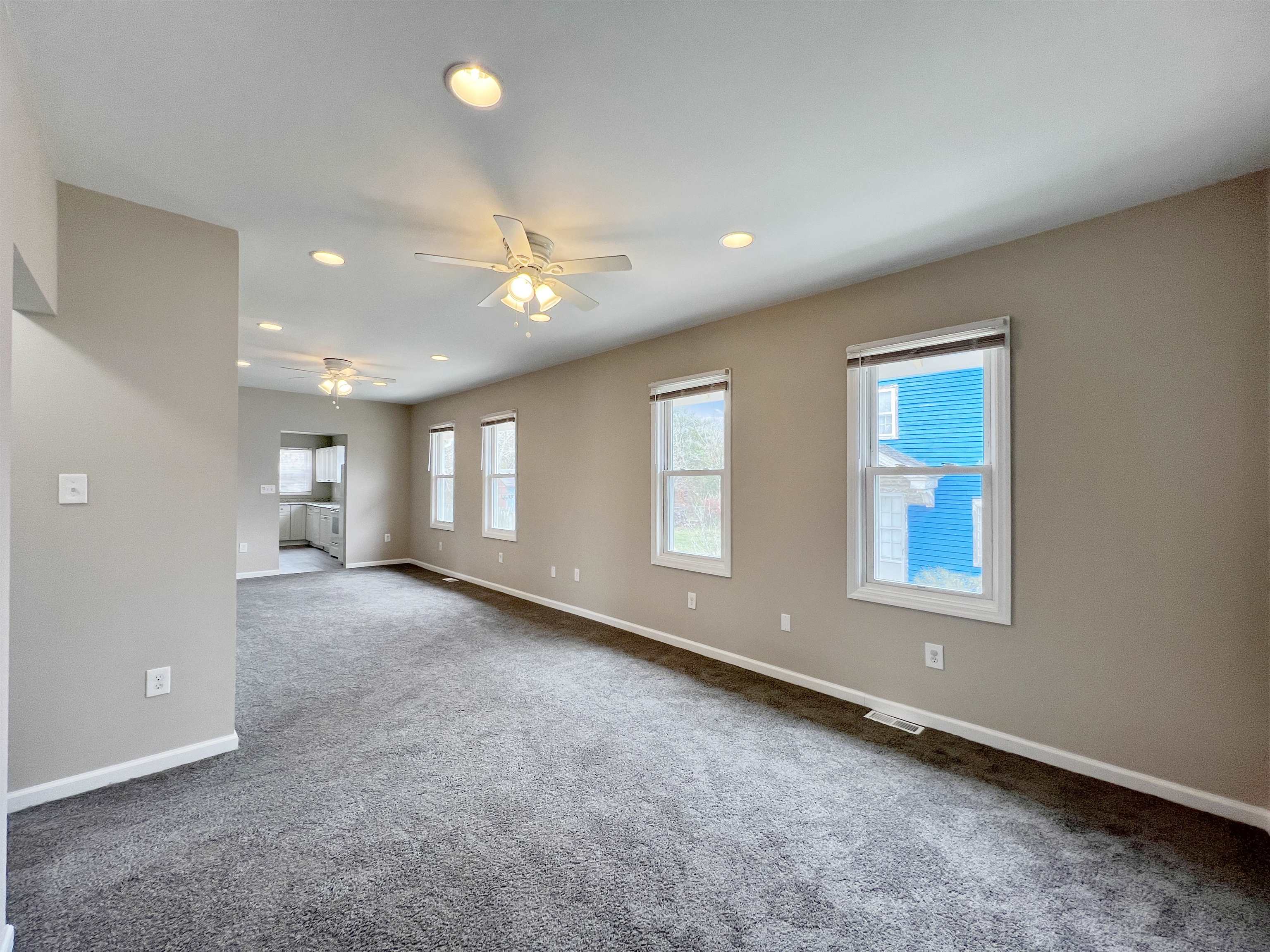 2117 Highway 50 Tuckahoe, NJ 08270 - Photo 8 of 23 an empty room with windows and ceiling fan
