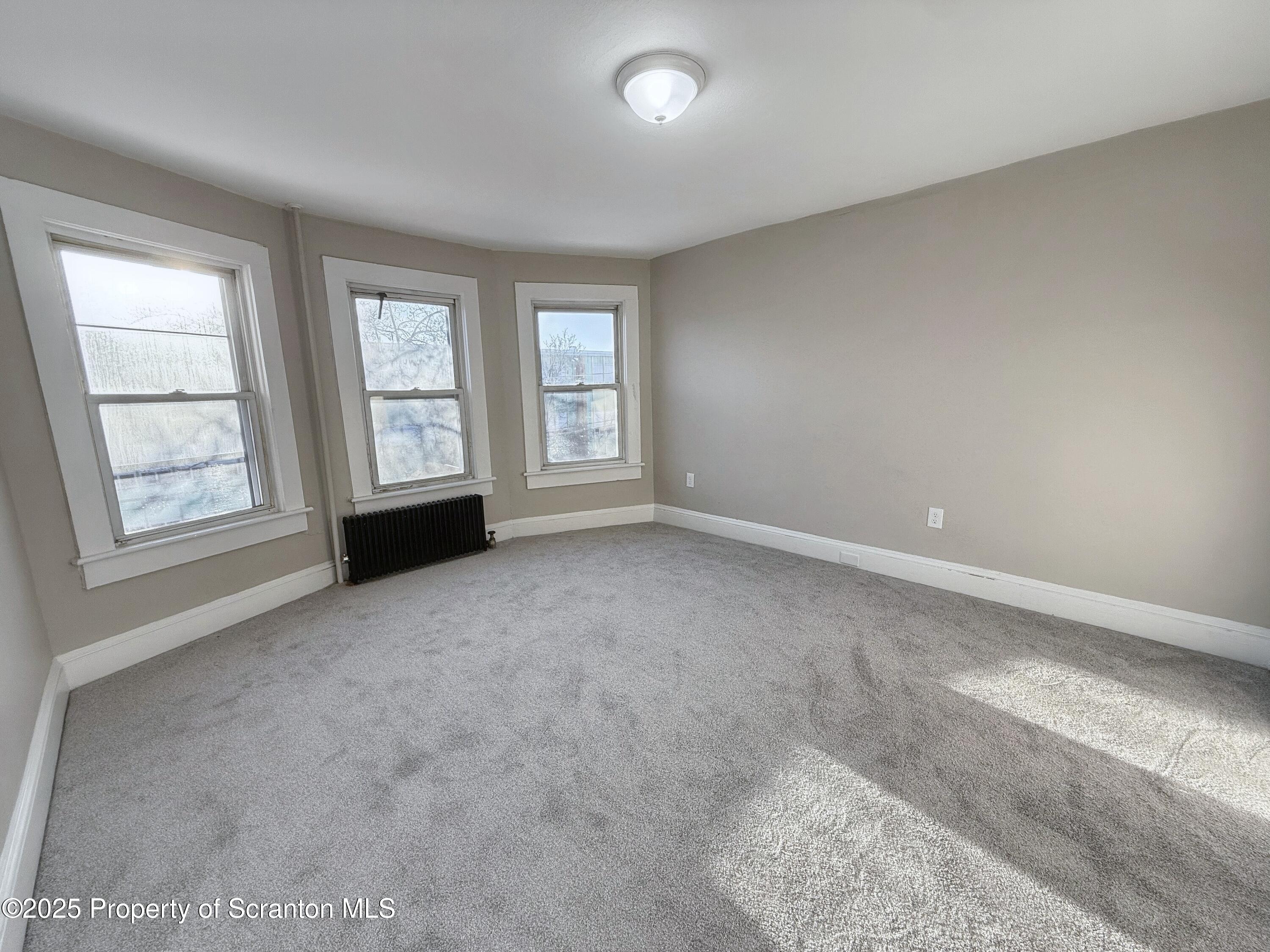 1513 15 Myrtle Street Scranton, PA 18510 - Photo 13 of 22 a view of an empty room with a window