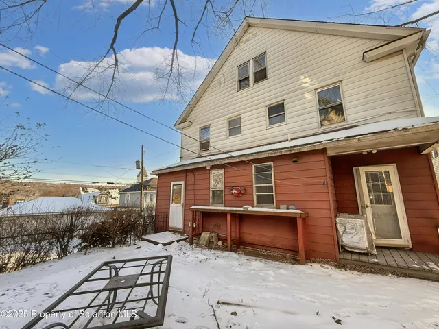 a view of a house with a patio